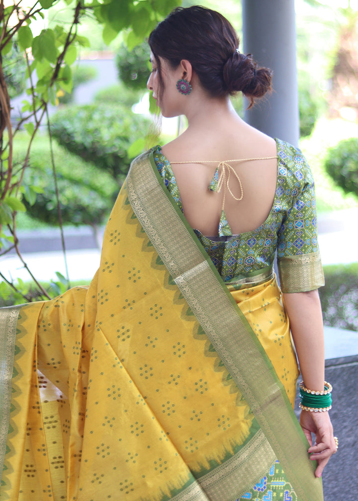 Aureolin Yellow Raw Silk Saree with Intricate Patola Print & Zari Pallu