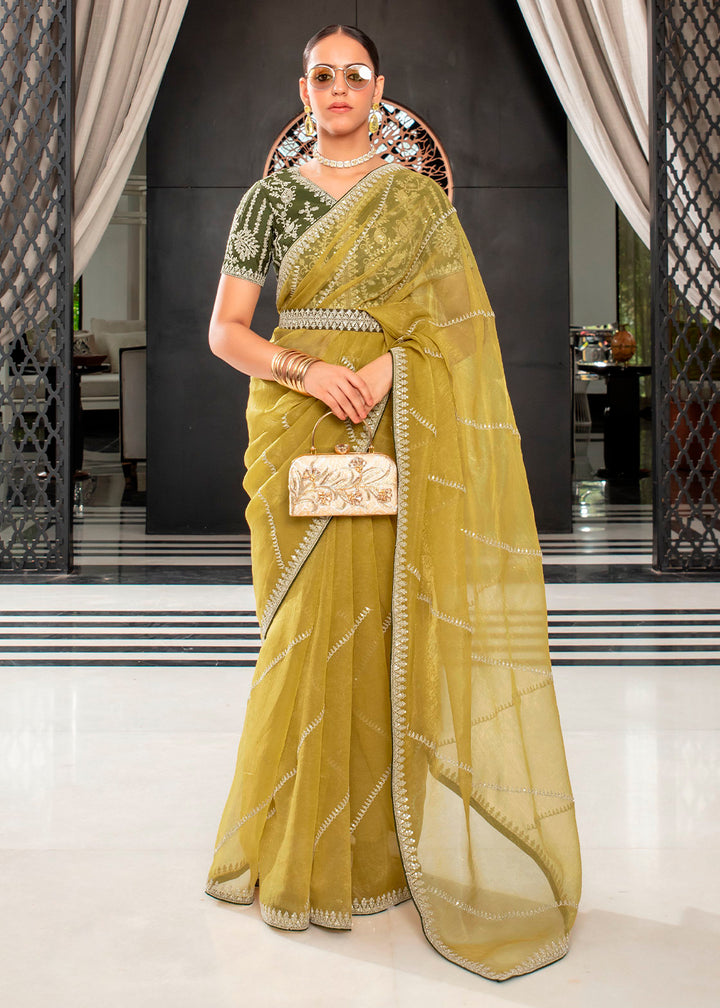 Chic Moss Green Organza Saree with Detailed Embroidery