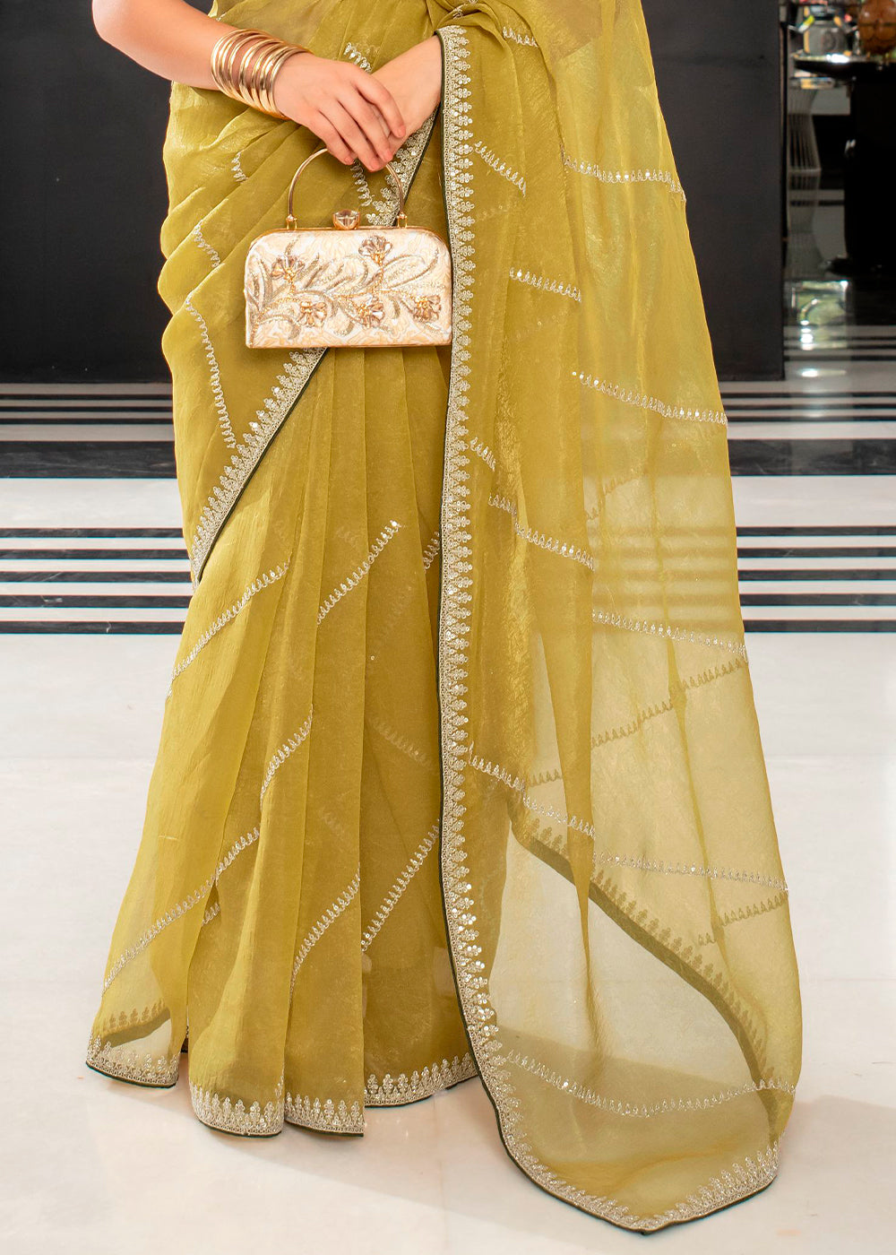 Chic Moss Green Organza Saree with Detailed Embroidery