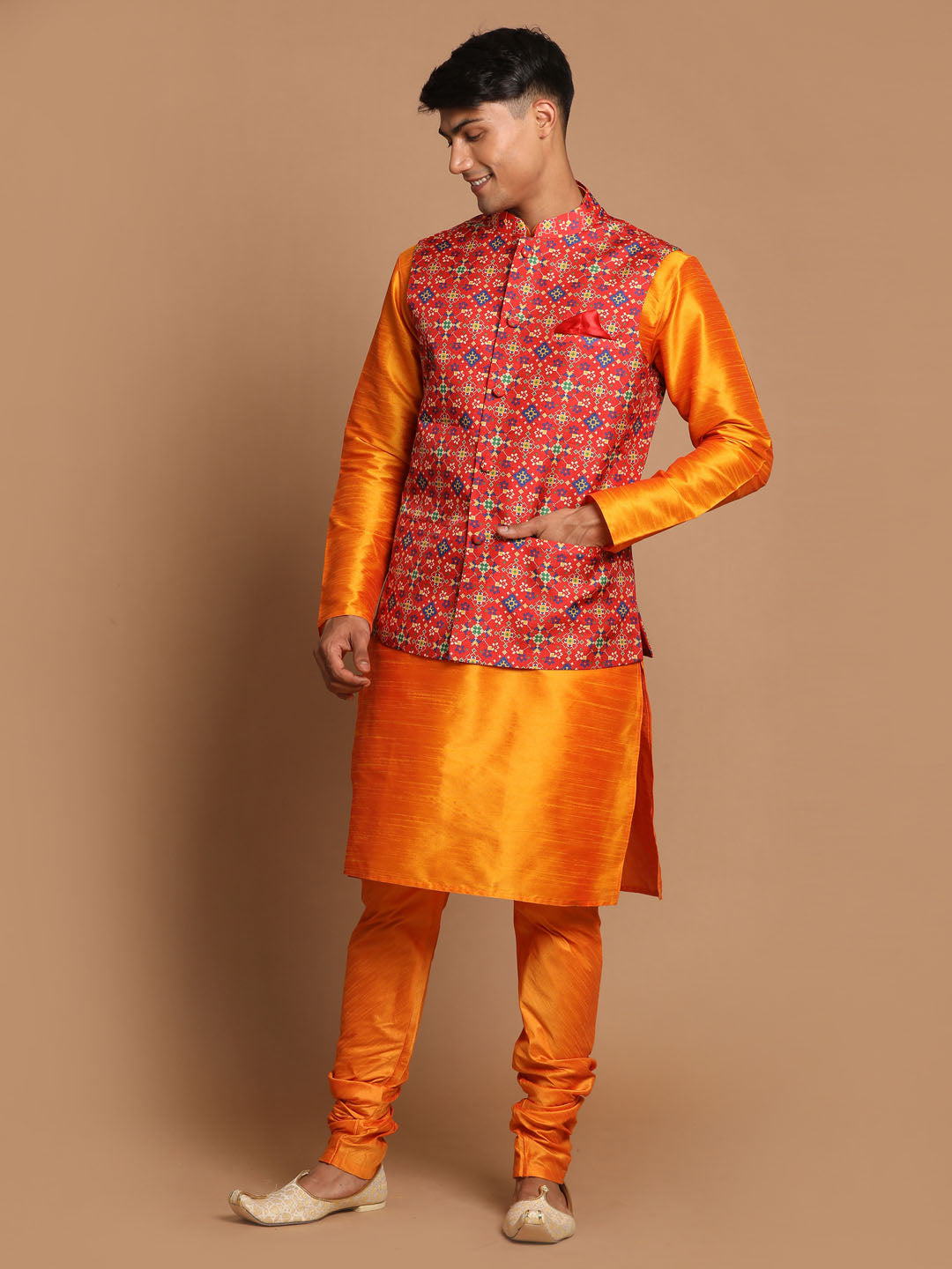 Sarvati Maroon Patola Print Nehru Jacket With Orange kurta Pyjama Set