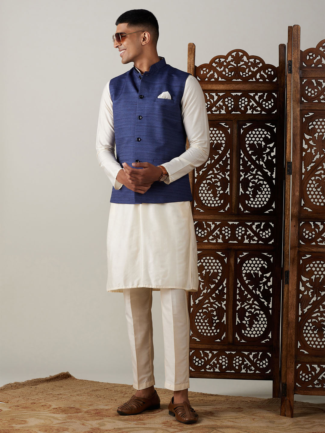 Sarvati Navy Blue Cotton Blend Solid Nehru Jacket With Cream Kurta And Pant Set