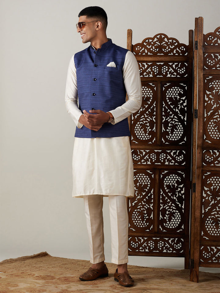 Sarvati Navy Blue Cotton Blend Solid Nehru Jacket With Cream Kurta And Pant Set