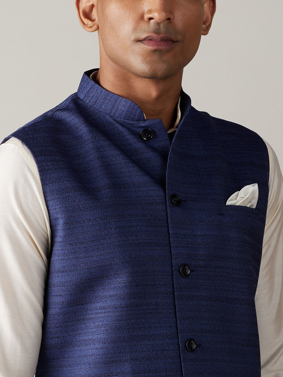 Sarvati Navy Blue Cotton Blend Solid Nehru Jacket With Cream Kurta And Pant Set