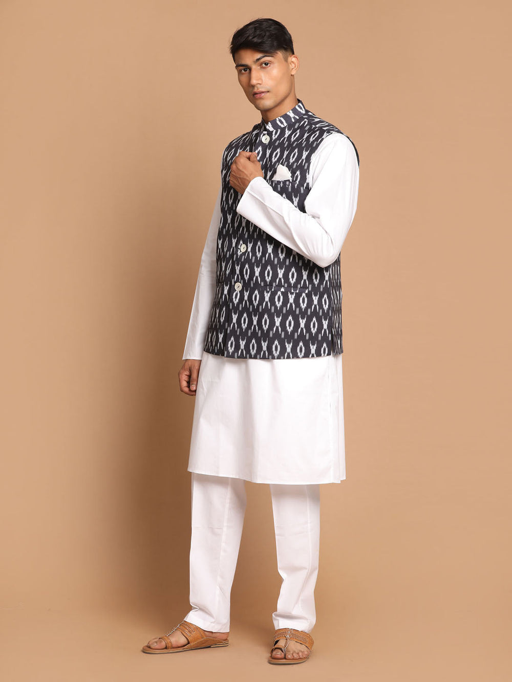 Sarvati Men's Black Ikkat Printed Cotton Nehru Jacket With White Kurta And Pyjama Set