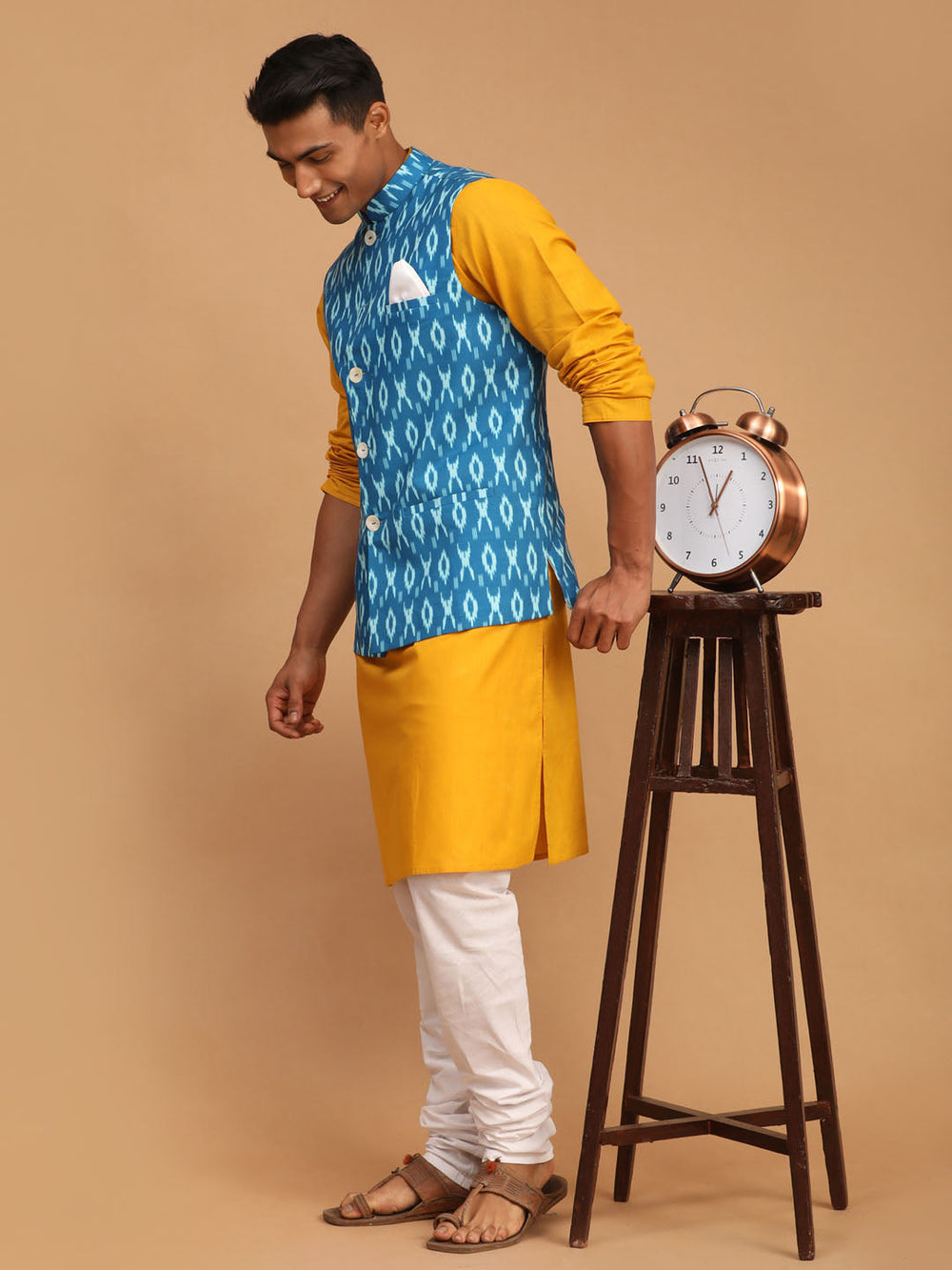 Sarvati Men's Turquoise Ikkat Printed Cotton Nehru Jacket With Mustard Kurta And White Pyjama Set