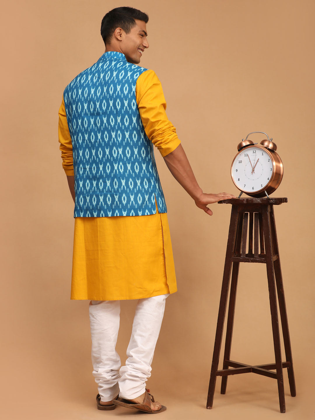 Sarvati Men's Turquoise Ikkat Printed Cotton Nehru Jacket With Mustard Kurta And White Pyjama Set