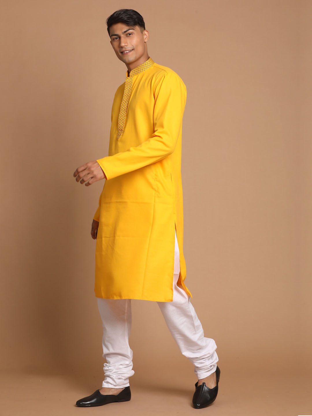 Sarvati Men's Yellow And White Solid Kurta With Churidar Set