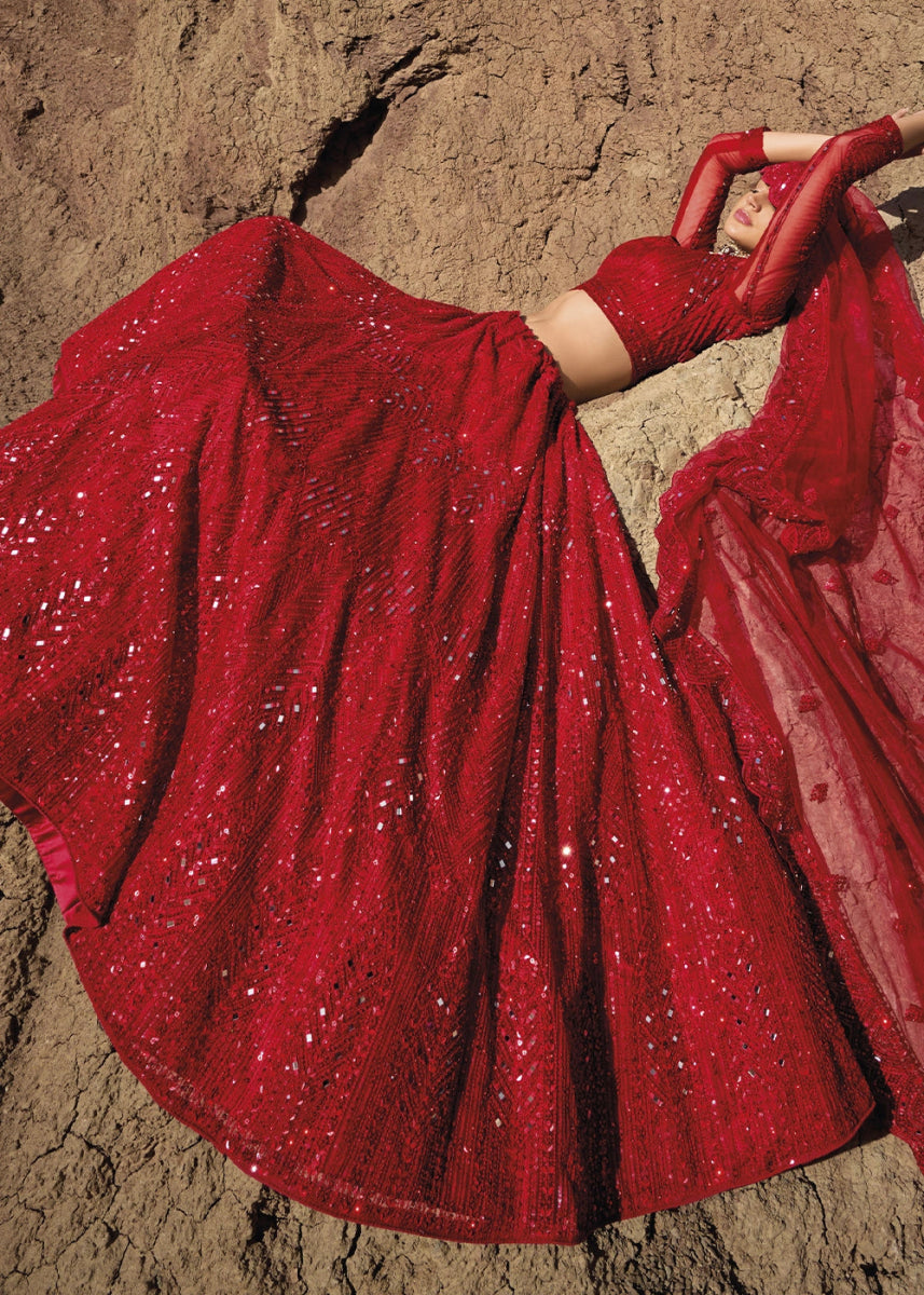 Crimson Red Net Lehenga Choli Adorned With Cutwork, Mirror, And Zarkan Embellishments - House of Sarvati LLC