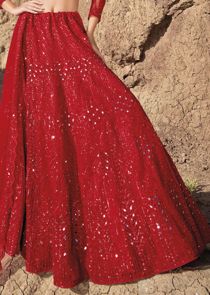 Crimson Red Net Lehenga Choli Adorned With Cutwork, Mirror, And Zarkan Embellishments - House of Sarvati LLC