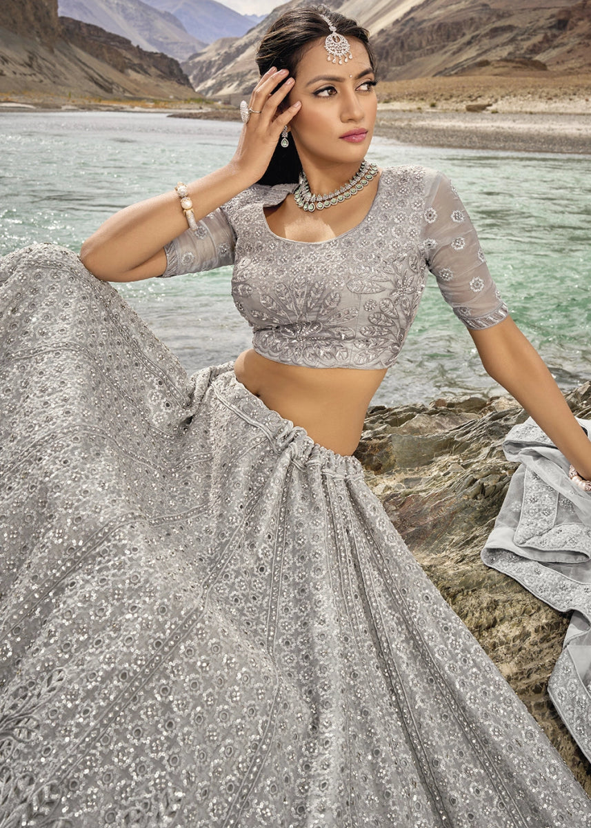 Dove Grey Organza Lehenga Choli Adorned With Cutwork, Mirror, And Zarkan Embellishments - House of Sarvati LLC