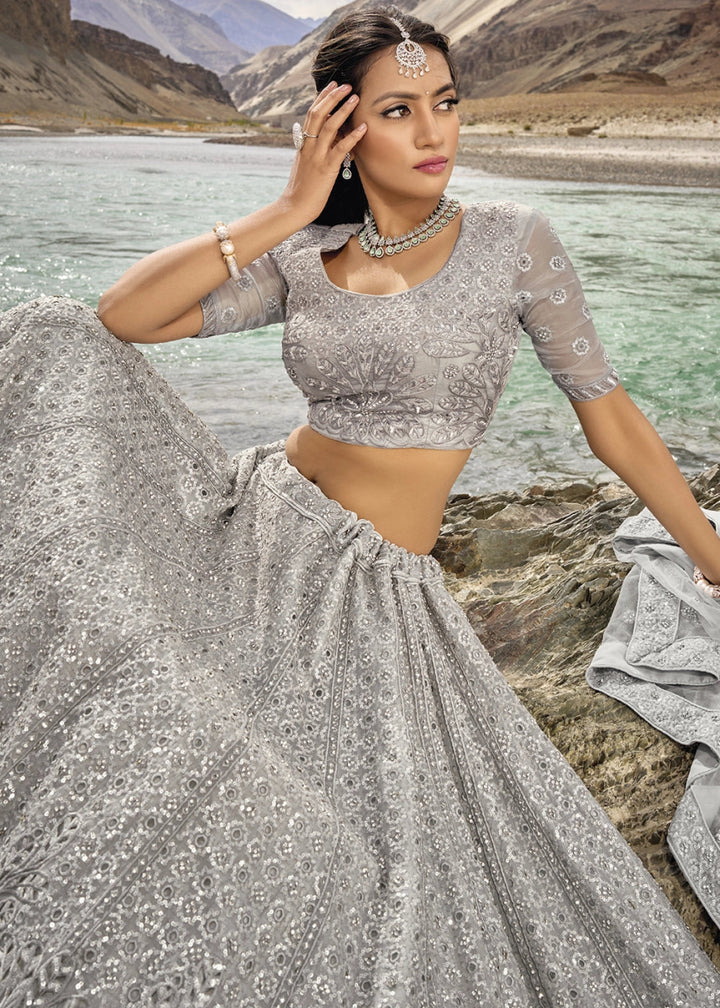 Dove Grey Organza Lehenga Choli Adorned With Cutwork, Mirror, And Zarkan Embellishments - House of Sarvati LLC