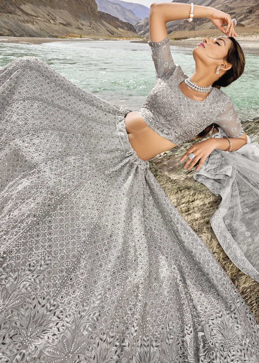 Dove Grey Organza Lehenga Choli Adorned With Cutwork, Mirror, And Zarkan Embellishments - House of Sarvati LLC