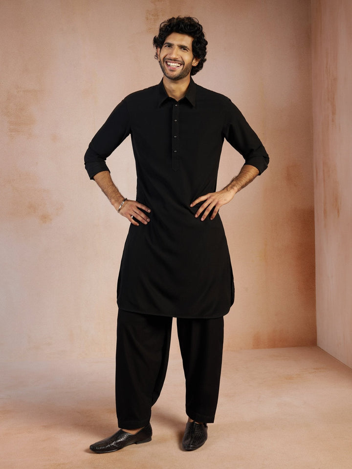 https://cdn.shopify.com/s/files/1/1147/1390/files/mens-black-solid-silk-blend-pathani-kurta-with-patiala-pyjama-setvasmpt1045blnp-36vastramay-2124258.jpg?v=1773990311