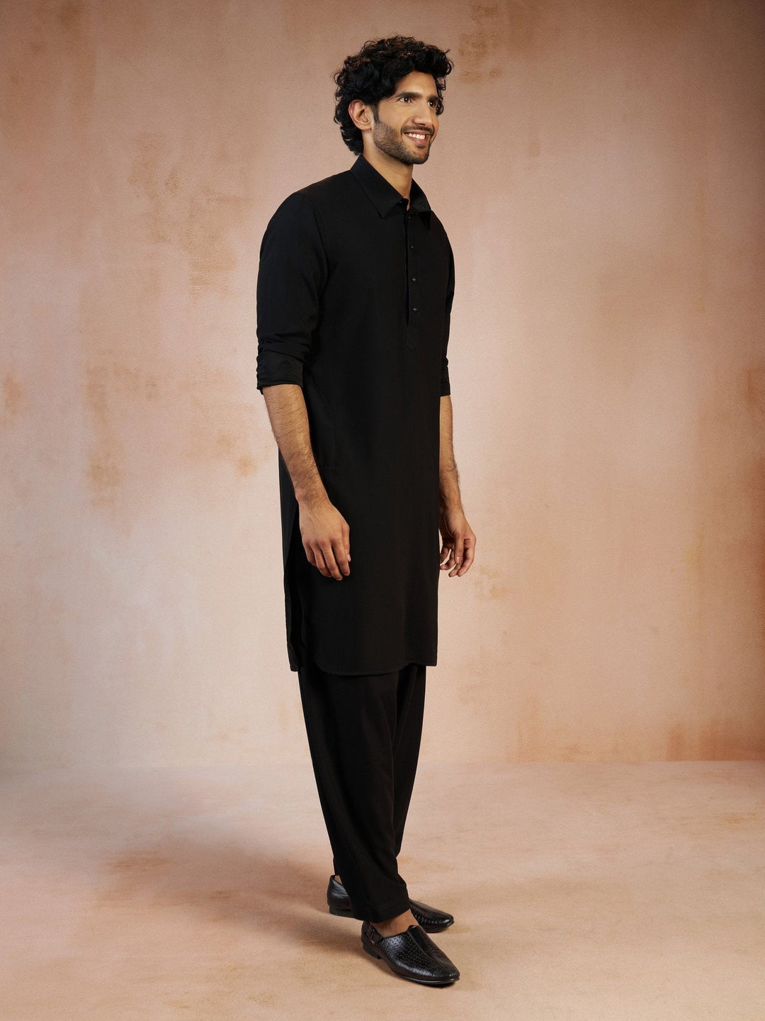 https://cdn.shopify.com/s/files/1/1147/1390/files/mens-black-solid-silk-blend-pathani-kurta-with-patiala-pyjama-setvasmpt1045blnp-36vastramay-2511262.jpg?v=1773990312