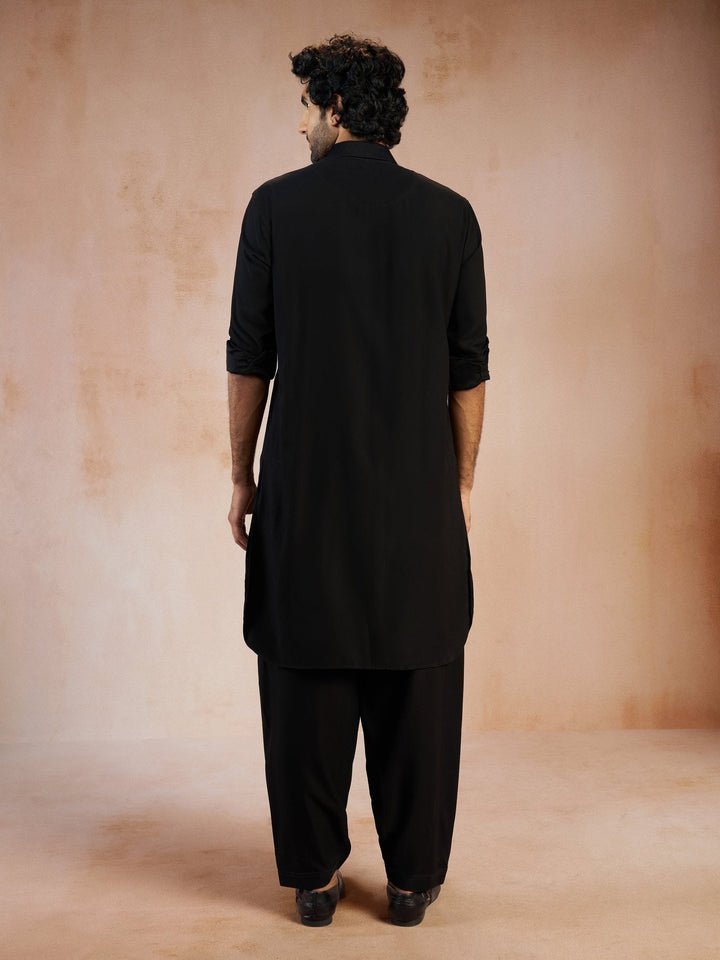 https://cdn.shopify.com/s/files/1/1147/1390/files/mens-black-solid-silk-blend-pathani-kurta-with-patiala-pyjama-setvasmpt1045blnp-36vastramay-7712095.jpg?v=1773990312