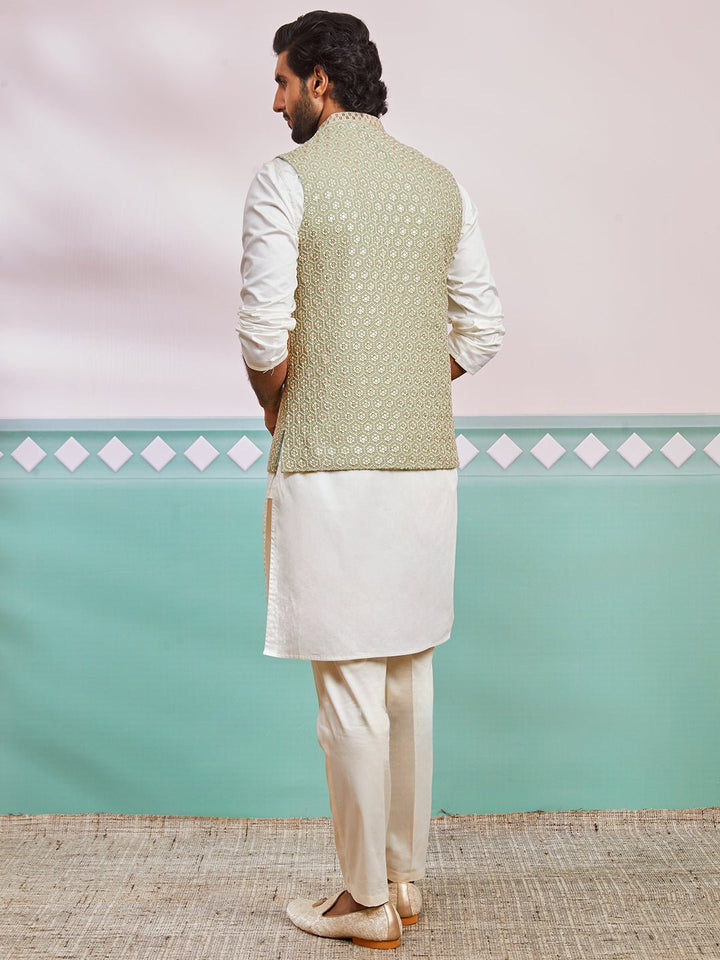 https://cdn.shopify.com/s/files/1/1147/1390/files/mens-cream-kurta-pyjama-set-with-pista-green-embroidered-nehru-jacketvasmj633psnk686crnp865cr-36vastramay-2658226.jpg?v=1773991340