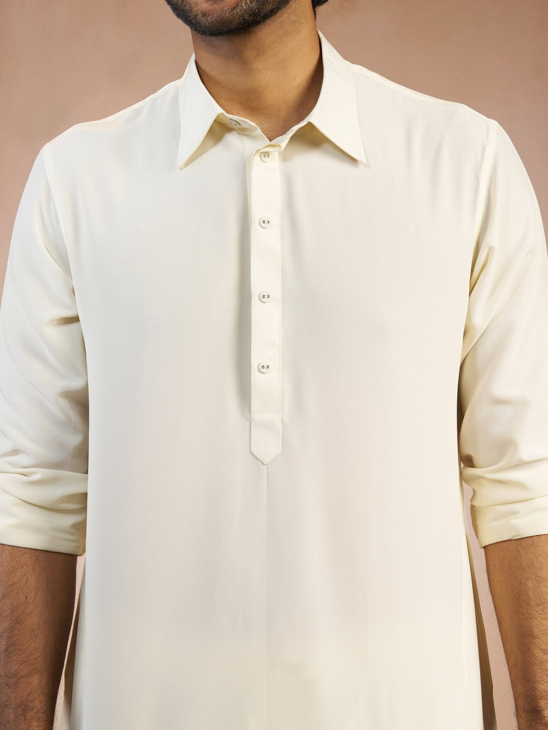 https://cdn.shopify.com/s/files/1/1147/1390/files/mens-cream-solid-silk-blend-pathani-kurta-with-patiala-pyjama-setvasmpt1045crnp-36vastramay-9139034.jpg?v=1773990380