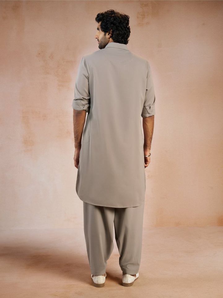 https://cdn.shopify.com/s/files/1/1147/1390/files/mens-grey-solid-silk-blend-pathani-kurta-with-patiala-pyjama-setvasmpt1045gynp-36vastramay-2587115.jpg?v=1773990317