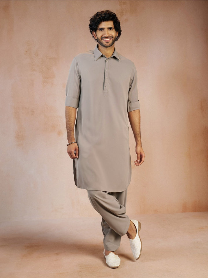 https://cdn.shopify.com/s/files/1/1147/1390/files/mens-grey-solid-silk-blend-pathani-kurta-with-patiala-pyjama-setvasmpt1045gynp-36vastramay-7382677.jpg?v=1773990318