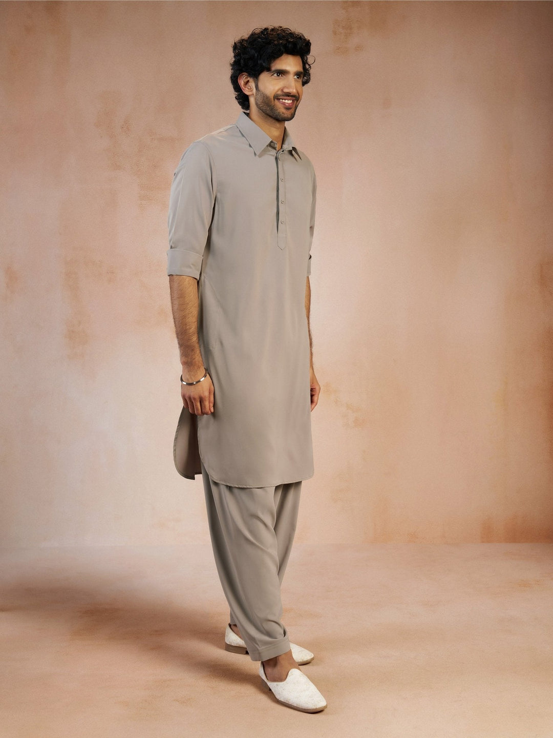 https://cdn.shopify.com/s/files/1/1147/1390/files/mens-grey-solid-silk-blend-pathani-kurta-with-patiala-pyjama-setvasmpt1045gynp-36vastramay-9790222.jpg?v=1773990318