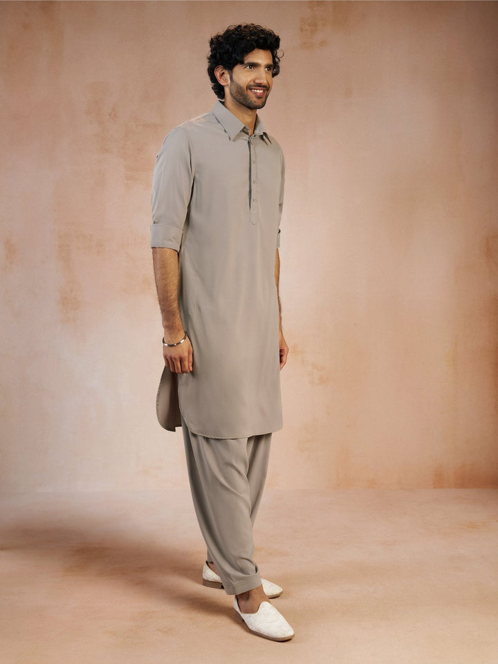 https://cdn.shopify.com/s/files/1/1147/1390/files/mens-grey-solid-silk-blend-pathani-kurta-with-patiala-pyjama-setvasmpt1045gynp-36vastramay-9790222.jpg?v=1773990318
