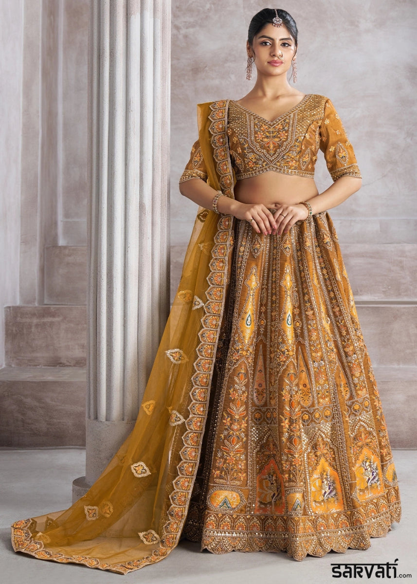 Mustard Yellow Banarasi Silk Lehenga Choli Embellished With Sequins, Aari Work And Floral Detailing - House of Sarvati LLC