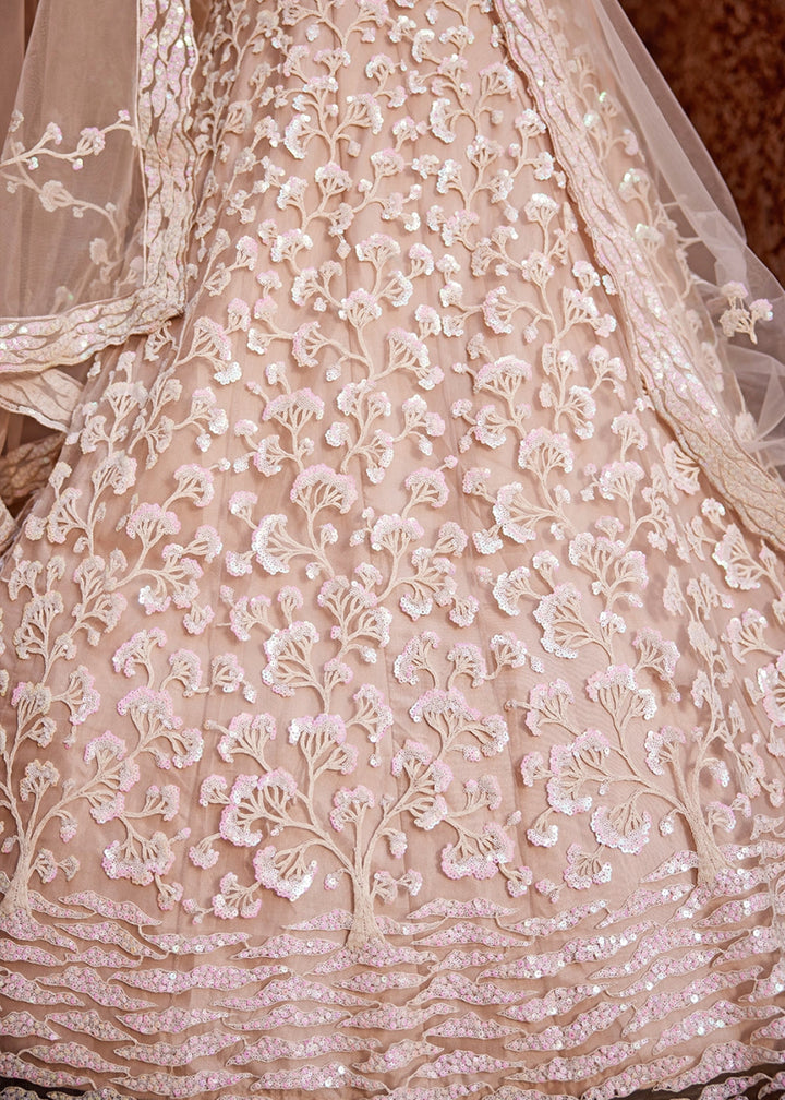Nude Pink Net Lehenga Choli with Floral Sequin Detailing - House of Sarvati LLC