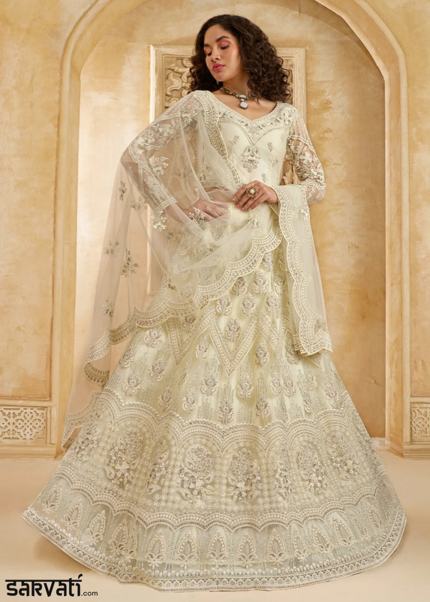 Off White Net Lehenga Choli with Handcrafted Cording, Thread, and Stone Work - House of Sarvati LLC