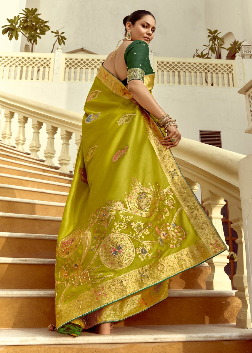 Olive Green Dola Silk Saree Featuring Zari Weave And Intricate Handwork With Cut Dana - House of Sarvati LLC