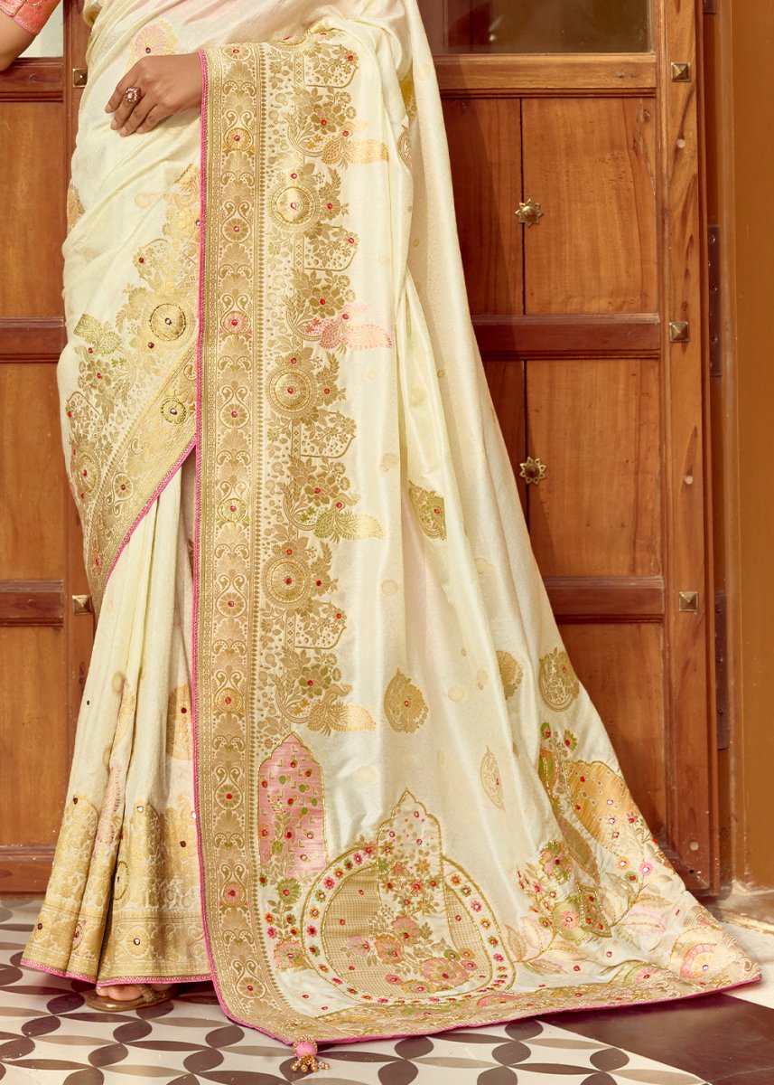 Pearl White Dola Silk Saree Featuring Zari Weave And Intricate Handwork With Cut Dana - House of Sarvati LLC
