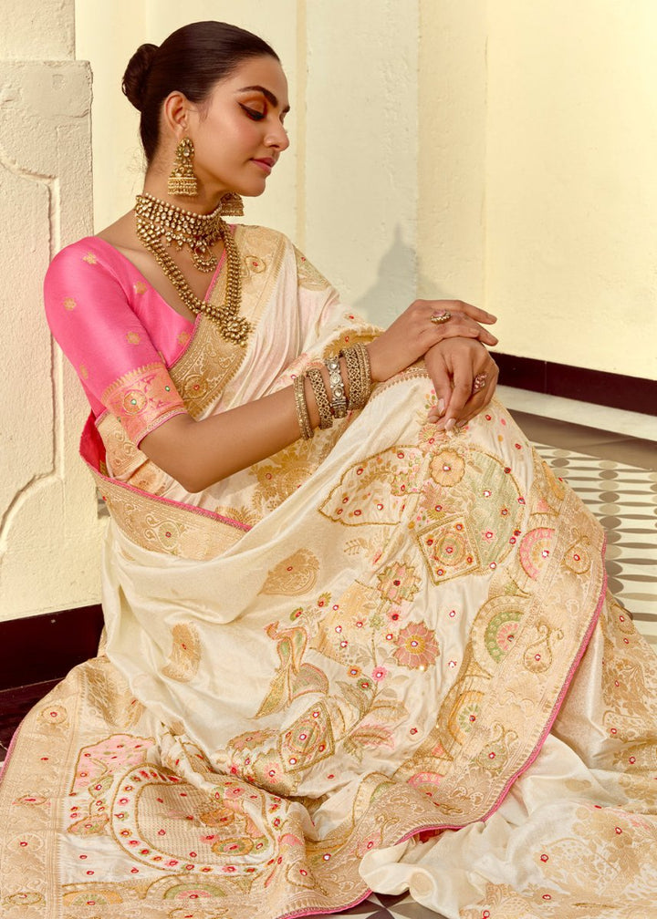 Pearl White Dola Silk Saree Featuring Zari Weave And Intricate Handwork With Cut Dana - House of Sarvati LLC