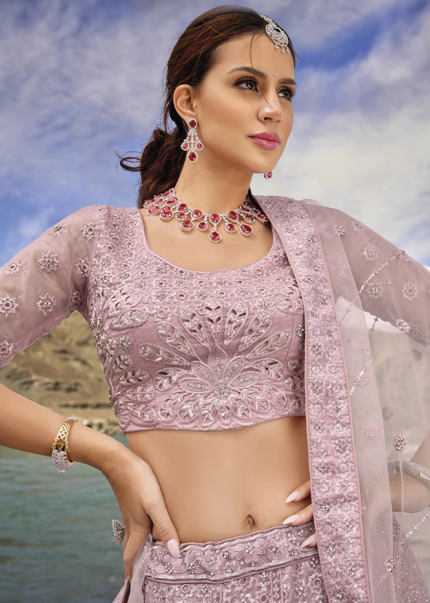 Pinkish Purple Organza Lehenga Choli Adorned With Cutwork, Mirror, And Zarkan Embellishments - House of Sarvati LLC