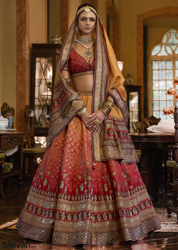 Shades Of Red & Yellow Embellished Rajwadi Silk Lehenga Choli with Aari Mirror Work - House of Sarvati LLC