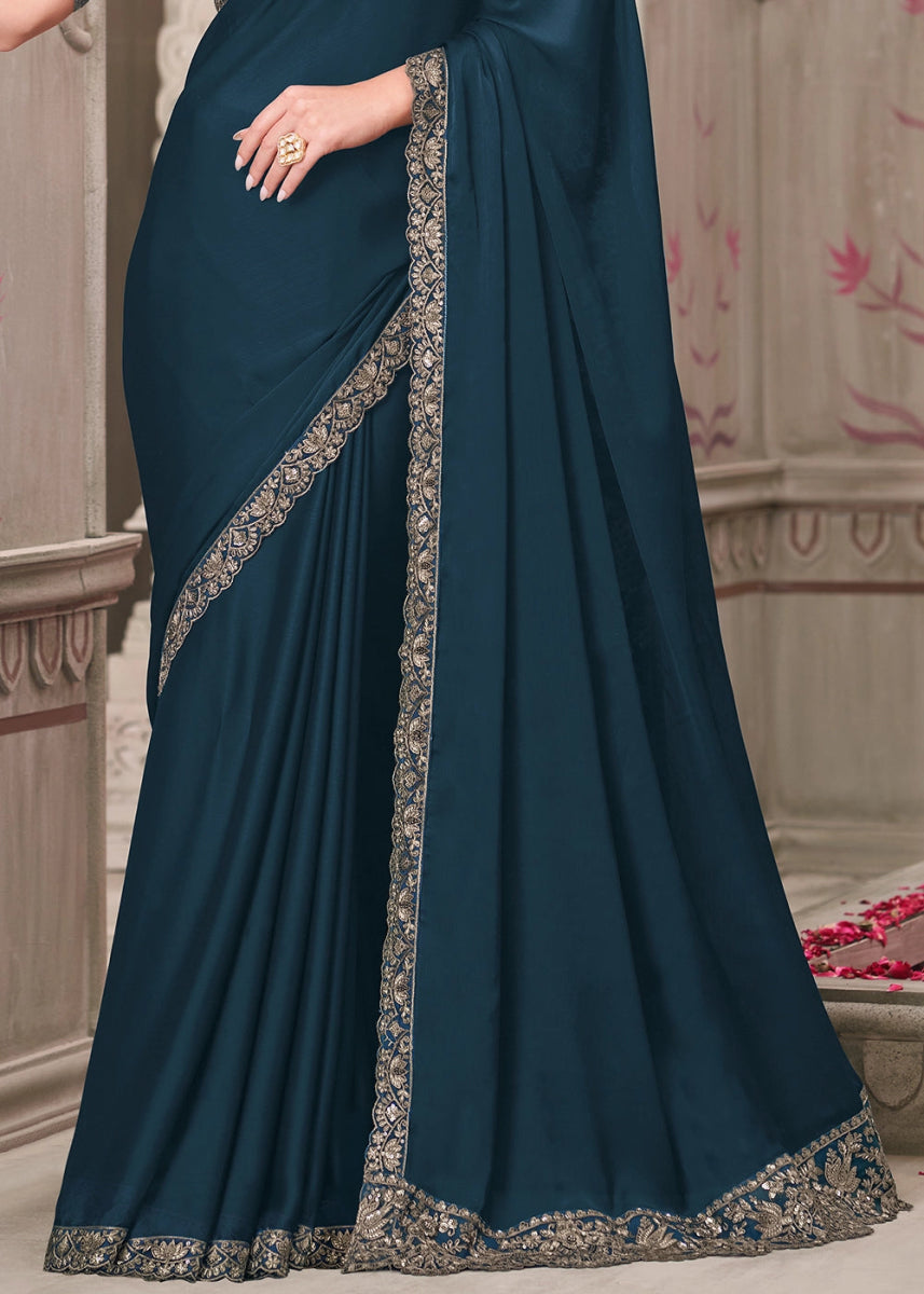 Spruce Blue Satin Georgette Saree With Detailed Embroidery And Luxe Appeal - House of Sarvati LLC